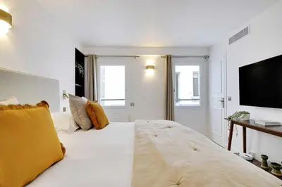 Un ou plusieurs lits dans un hébergement de l'établissement Superb apartment with AC - 1BR-2P - Arts et Métier