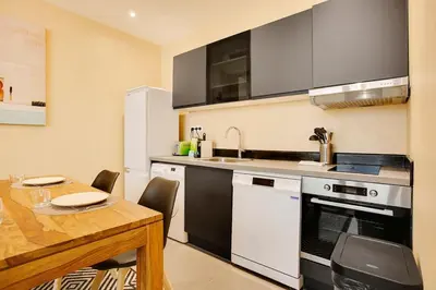 Cuisine ou kitchenette dans l'établissement Appart lumineux 4 personnes