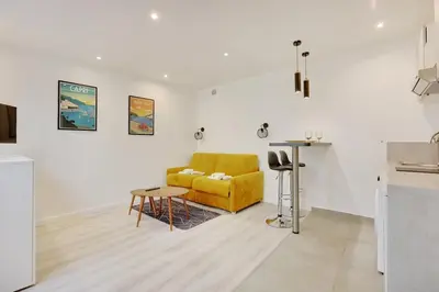 Cuisine ou kitchenette dans l'établissement Joli studio - Buttes-Chaumont
