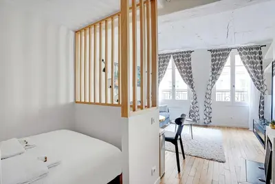 Un ou plusieurs lits dans un hébergement de l'établissement Saint-Honore - Sublime appartement