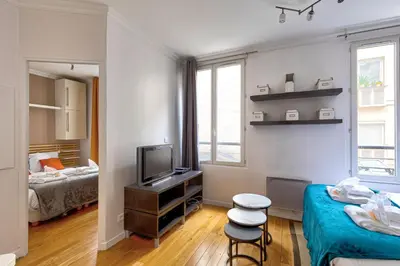 Un ou plusieurs lits dans un hébergement de l'établissement Bluestay 176 - Superbe Appartement à Paris