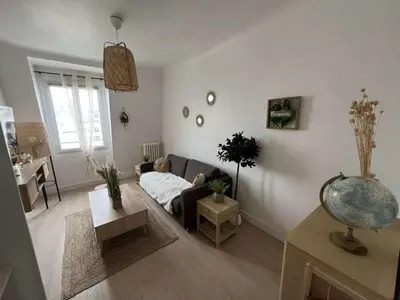 Coin salon dans l'établissement Charmant appartement aux Portes de Paris - 2PAX