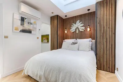 Un ou plusieurs lits dans un hébergement de l'établissement Charming Pied à Terre near Montmartre