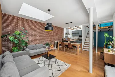 Coin salon dans l'établissement Grandeur Cachée du 15e - avec parking