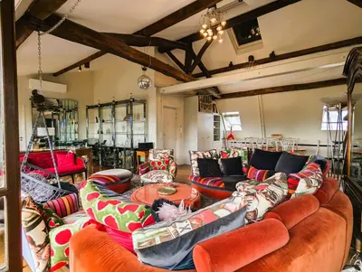 Coin salon dans l'établissement Vaste loft avec vue - Trudaine