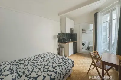 Cuisine ou kitchenette dans l'établissement Flexliving - Studio - Championnet