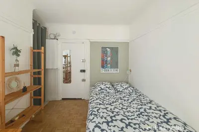 Un ou plusieurs lits dans un hébergement de l'établissement Flexliving - Studio - Championnet