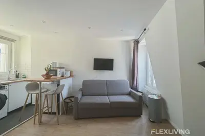 Coin salon dans l'établissement Flexliving - studio - Legendre