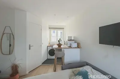 Cuisine ou kitchenette dans l'établissement Flexliving - studio - Legendre