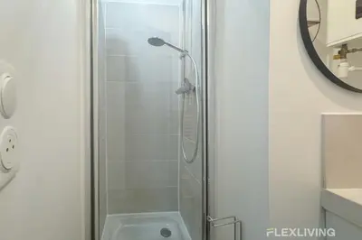 Salle de bains dans l'établissement Flexliving - studio - Legendre