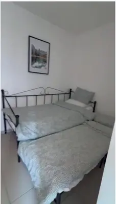 Un ou plusieurs lits dans un hébergement de l'établissement 10 min walk to metro, 2 bedrooms, la défense, parking