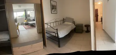 Un ou plusieurs lits dans un hébergement de l'établissement 10 min walk to metro, 2 bedrooms, la défense, parking
