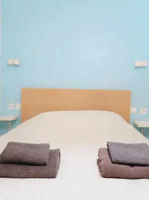 Un ou plusieurs lits dans un hébergement de l'établissement Chic & Modern Studio in Centre Paris Rambuteau