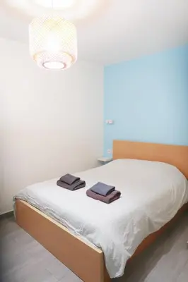 Un ou plusieurs lits dans un hébergement de l'établissement Chic & Modern Studio in Centre Paris Rambuteau