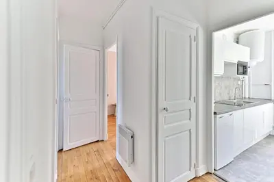 Cuisine ou kitchenette dans l'établissement Appartement lumineux Banlieue Parisienne - III