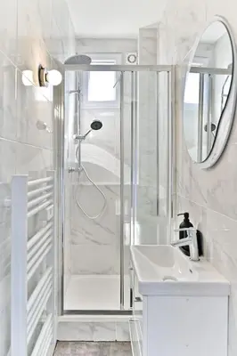 Salle de bains dans l'établissement Appartement lumineux Banlieue Parisienne - III