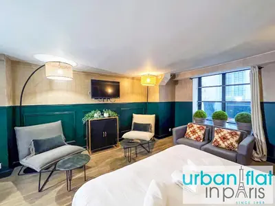 Télévision ou salle de divertissement dans l'établissement Urban Flat 31 - Charming Triplex in Paris