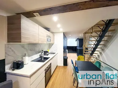 Cuisine ou kitchenette dans l'établissement Urban Flat 31 - Charming Triplex in Paris
