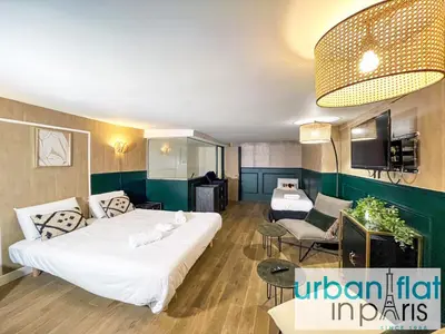 Un ou plusieurs lits dans un hébergement de l'établissement Urban Flat 31 - Charming Triplex in Paris