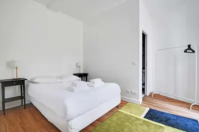 Un ou plusieurs lits dans un hébergement de l'établissement Comfortable apt - 1BD - 4P - Montmartre