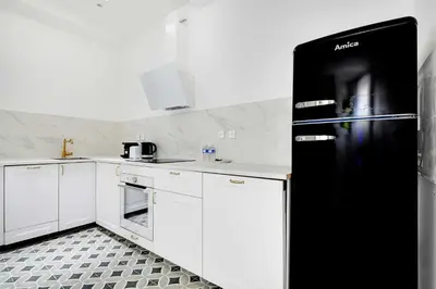 Cuisine ou kitchenette dans l'établissement Comfortable apt - 1BD - 4P - Montmartre