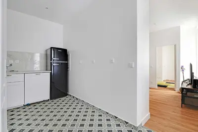 Cuisine ou kitchenette dans l'établissement Comfortable apt - 1BD - 4P - Montmartre
