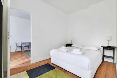 Un ou plusieurs lits dans un hébergement de l'établissement Comfortable apt - 1BD - 4P - Montmartre