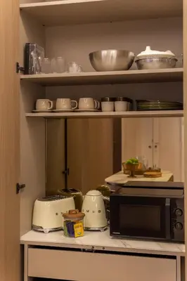 Cuisine ou kitchenette dans l'établissement Prestige l 3CH l 2SDB l Clim l Louvre