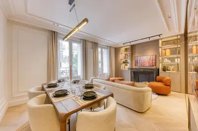 Coin salon dans l'établissement Prestige l 3CH l 2SDB l Clim l Louvre