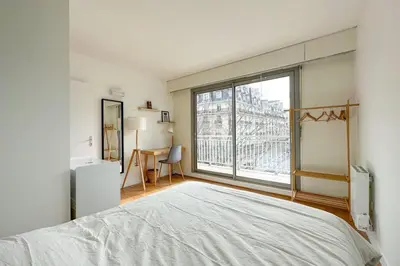 Un ou plusieurs lits dans un hébergement de l'établissement Flexliving - room - Ternes