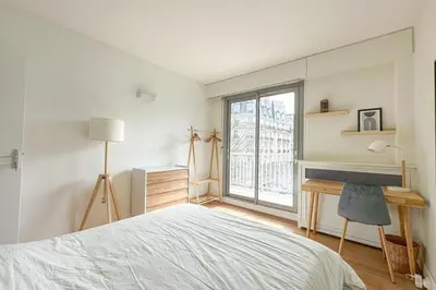 Un ou plusieurs lits dans un hébergement de l'établissement Flexliving - room - Ternes