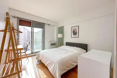 Un ou plusieurs lits dans un hébergement de l'établissement Flexliving - room - Ternes