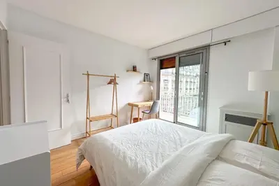 Un ou plusieurs lits dans un hébergement de l'établissement Flexliving - room - Ternes