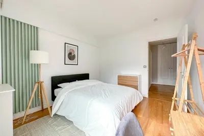 Un ou plusieurs lits dans un hébergement de l'établissement Flexliving - room - Ternes