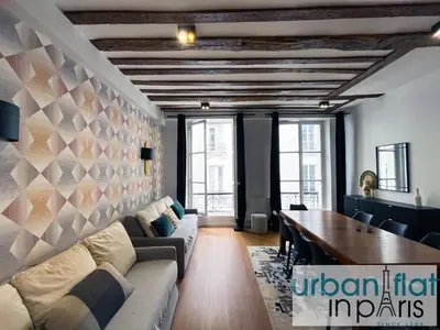 Coin salon dans l'établissement Urban Flat 108 - Classic Parisian 4 BDR Flat