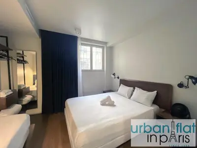 Un ou plusieurs lits dans un hébergement de l'établissement Urban Flat 78 - Luxury 3 BDR Flat in Le Marais