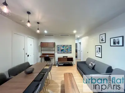 Coin salon dans l'établissement Urban Flat 78 - Luxury 3 BDR Flat in Le Marais