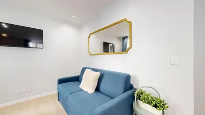 Télévision ou salle de divertissement dans l'établissement Bluestay 196 - Charmant Appartement au Marais