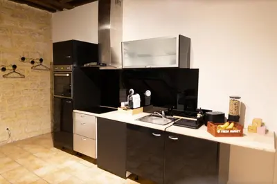 Cuisine ou kitchenette dans l'établissement Atelier des Shadoks