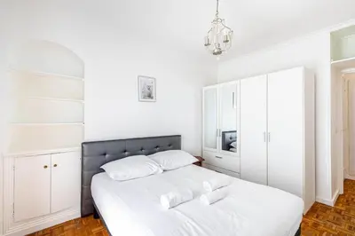 Un ou plusieurs lits dans un hébergement de l'établissement GuestReady - Apt Lumineux près de la Gare de l'Est