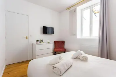 Un ou plusieurs lits dans un hébergement de l'établissement Appartement10P#Full Equipped#BONNE NOUVELLE#BOURSE