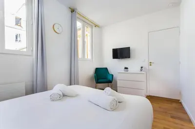 Un ou plusieurs lits dans un hébergement de l'établissement Appartement10P#Full Equipped#BONNE NOUVELLE#BOURSE