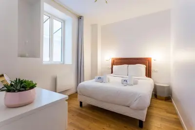 Un ou plusieurs lits dans un hébergement de l'établissement Appartement10P#Full Equipped#BONNE NOUVELLE#BOURSE