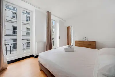 Un ou plusieurs lits dans un hébergement de l'établissement Paris Marais Maison Lombard