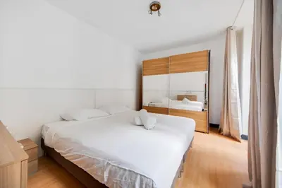Un ou plusieurs lits dans un hébergement de l'établissement Paris Marais Maison Lombard