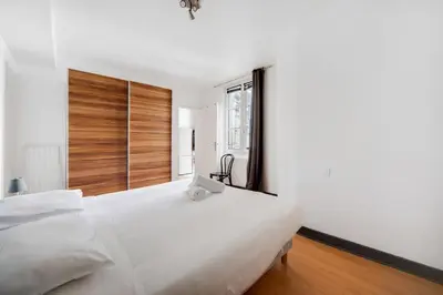 Un ou plusieurs lits dans un hébergement de l'établissement Paris Marais Maison Lombard