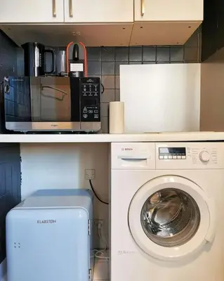 Cuisine ou kitchenette dans l'établissement 45m2 Calm APT with elevator 50m to metro Saint Paul N4-4