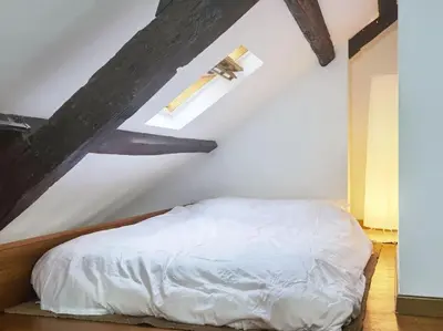 Un ou plusieurs lits dans un hébergement de l'établissement Calm Loft apt in the center of 11arr N11-199