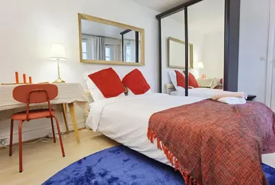 Un ou plusieurs lits dans un hébergement de l'établissement Chic Studio 30ms to Le Bon Marche N6-71