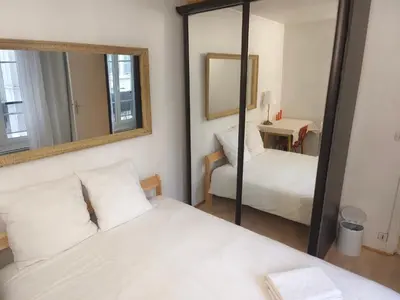 Un ou plusieurs lits dans un hébergement de l'établissement Chic Studio 30ms to Le Bon Marche N6-71